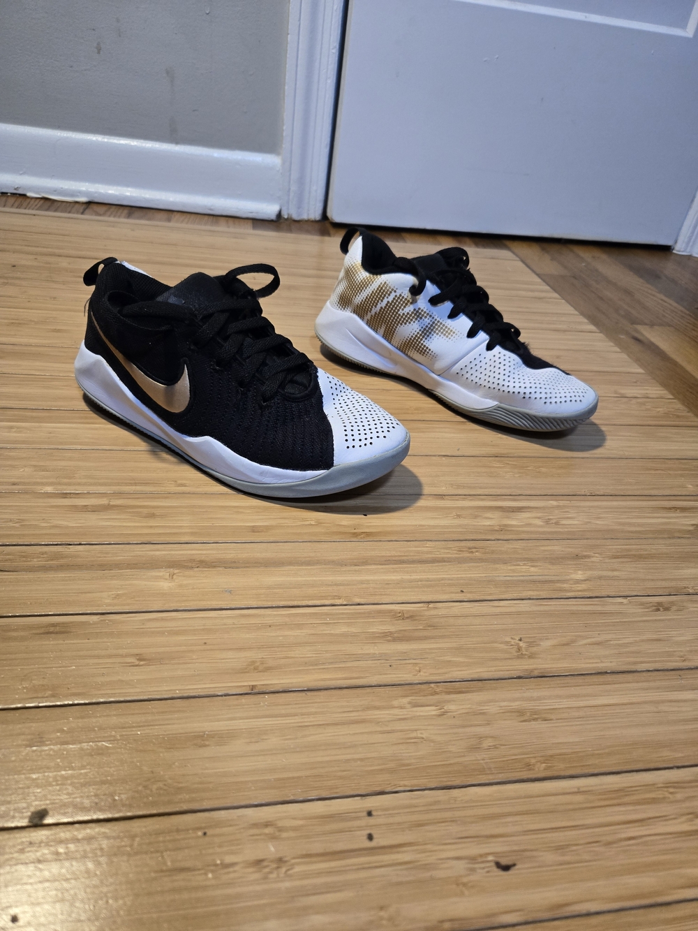 Nike Boy Black and White Basketball Shoes with Gold Accents